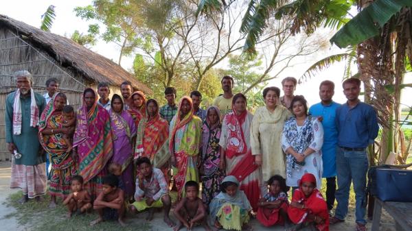A group of people in a Miyah village in India